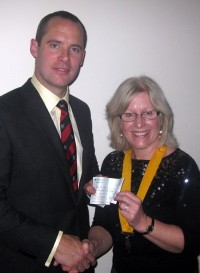 Sue Parkin presents a cheque to Major Andy Rhodes on 18th Dec 2008